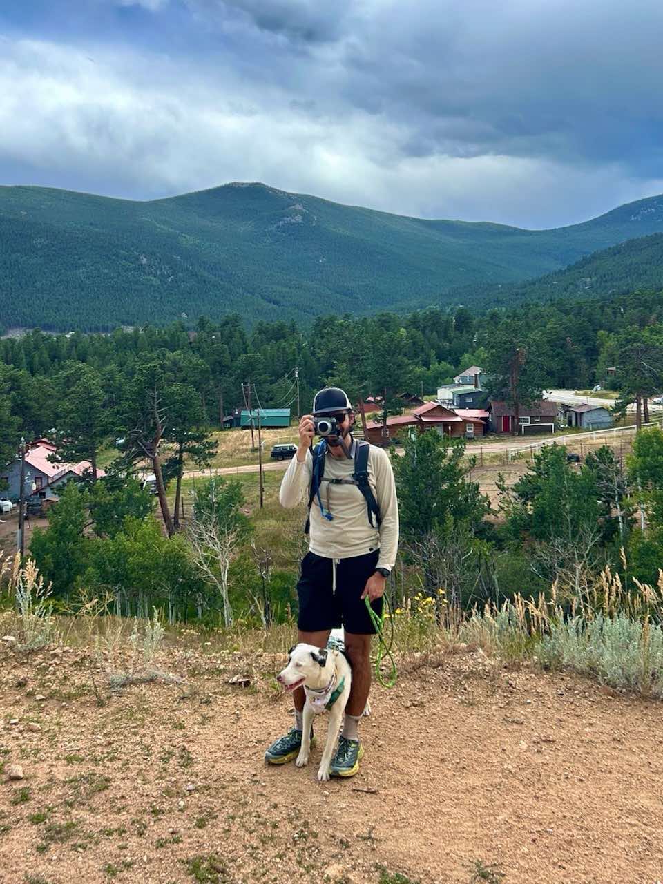 Kyle running with his dog on a Longmont trail